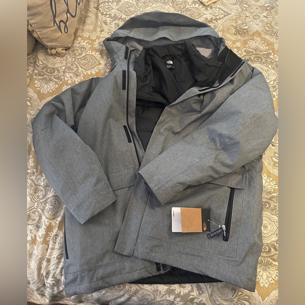 Men's XL Clement tri jacket. There is an internal down zip out jacket.